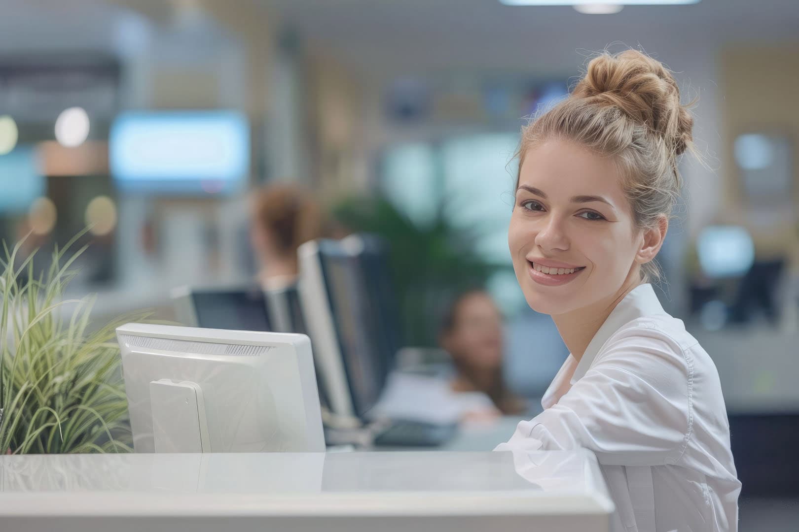 office receptionist directing visitors to right departments